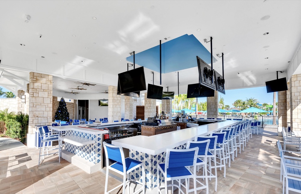 Poolside tiki bar and restaurant seating at the Windsor Island Resort clubhouse